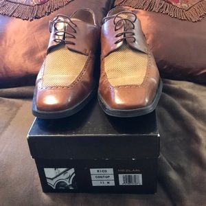 A pair of Mezlan shoes and matching belt.